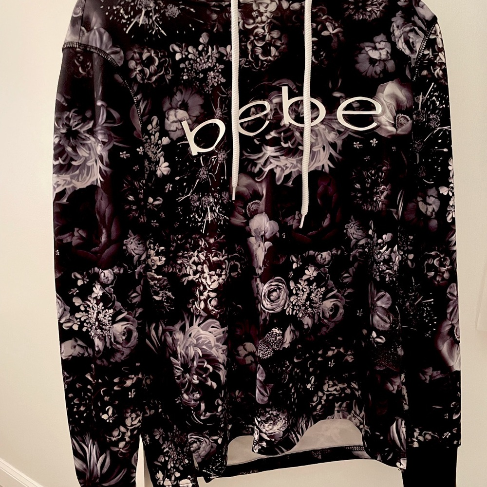 Bebe long sleeve sweat shirt/ worn a few times